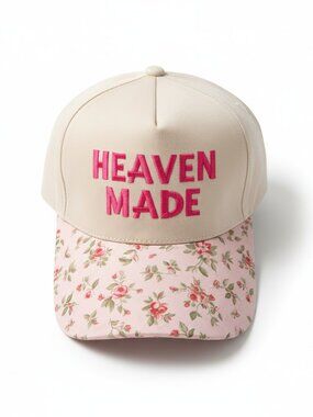 Brand New adjustable cap with a floral brim says Heaven Made
